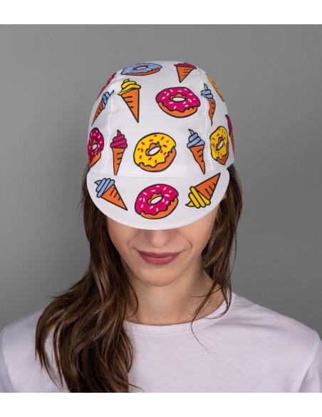 pretty girl wearing Luxa cycling cap with donuts and colorful ice cream