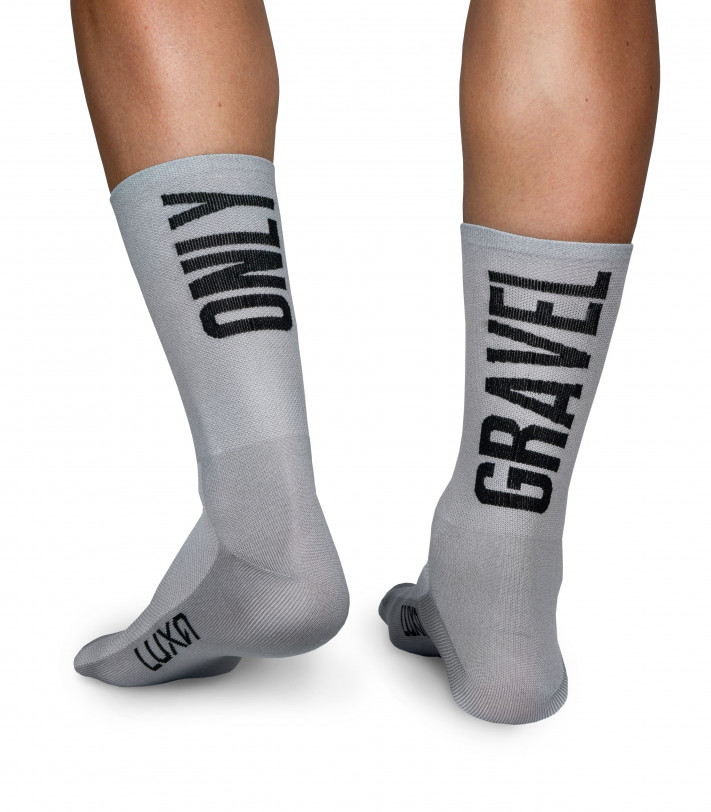 gravel cycling socks in gray color. Big caption Only Gravel on both sides