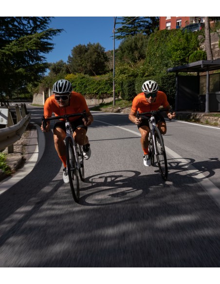 fast descent in Sicily - we are testing new orange summer jerseys for riding in high temperatures.