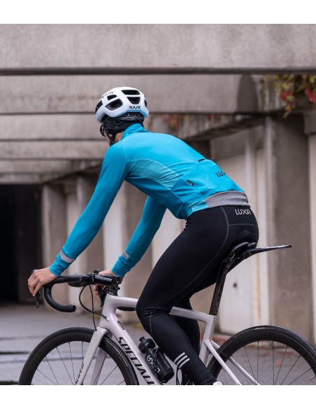 road bike with a Luxa 'ass saver' under the saddle made of recycled plastic, features quick assembly system.