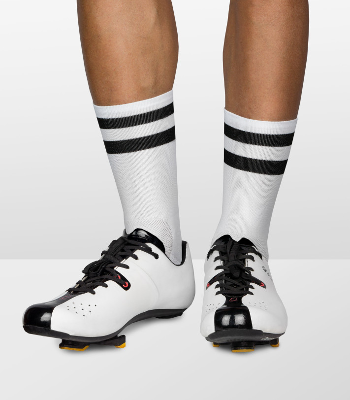 white unisex road cycling socks with back stripes around both socks
