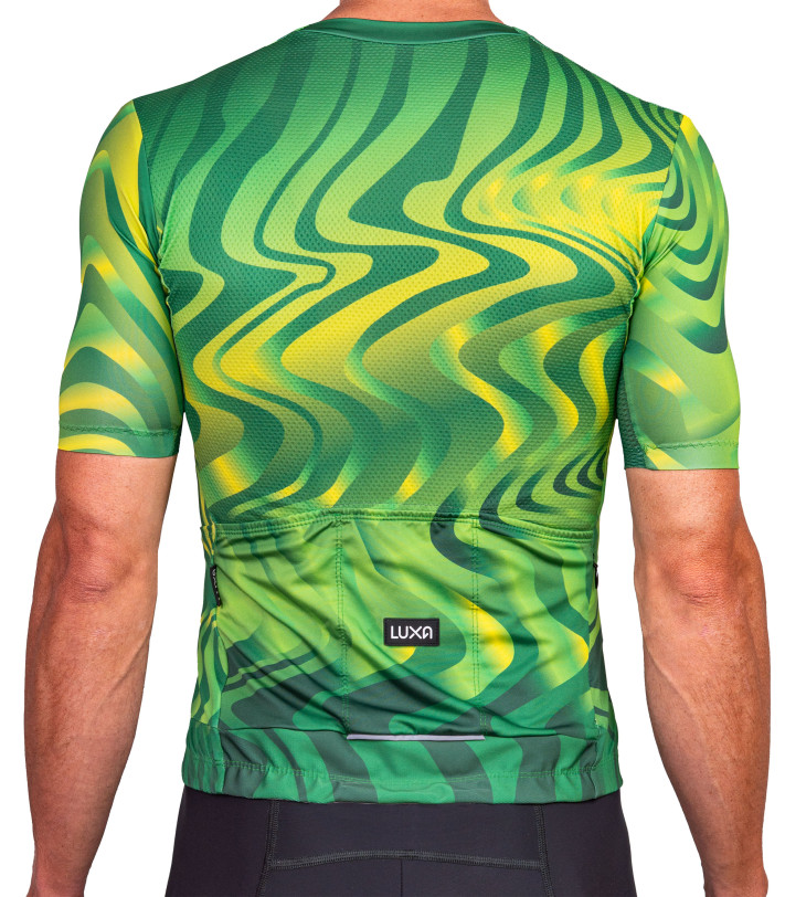 Tył zielonej koszulki kolarskiej Luxa Pulse Burst – anatomiczny krój i kontrastowy, dynamiczny wzór.