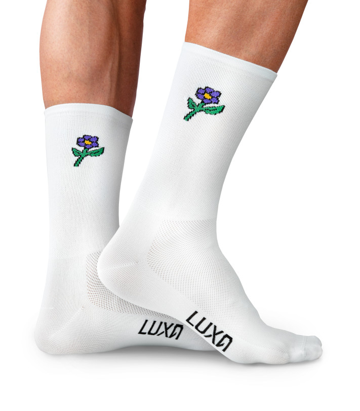 Emoji Violett cycling socks worn on feet – front and side view