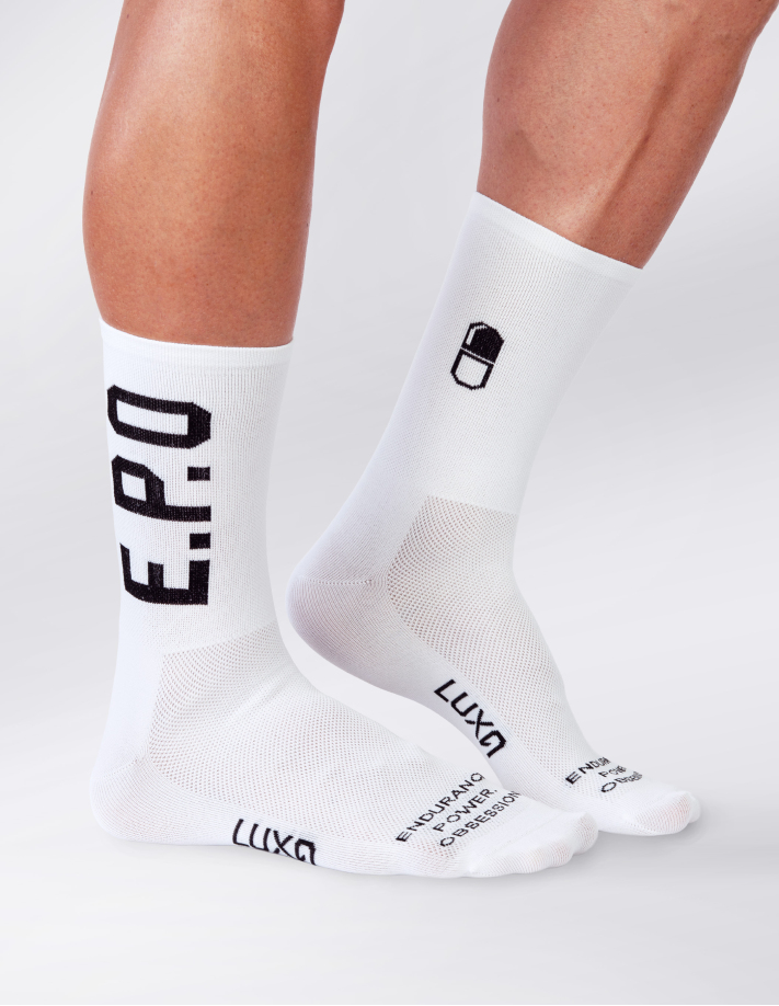 white Luxa cycling socks E.P.O. worn on legs
