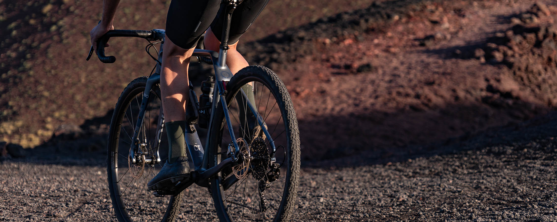 Gravel cyclists wear khaki socks to avoid dirt and stains during the ride